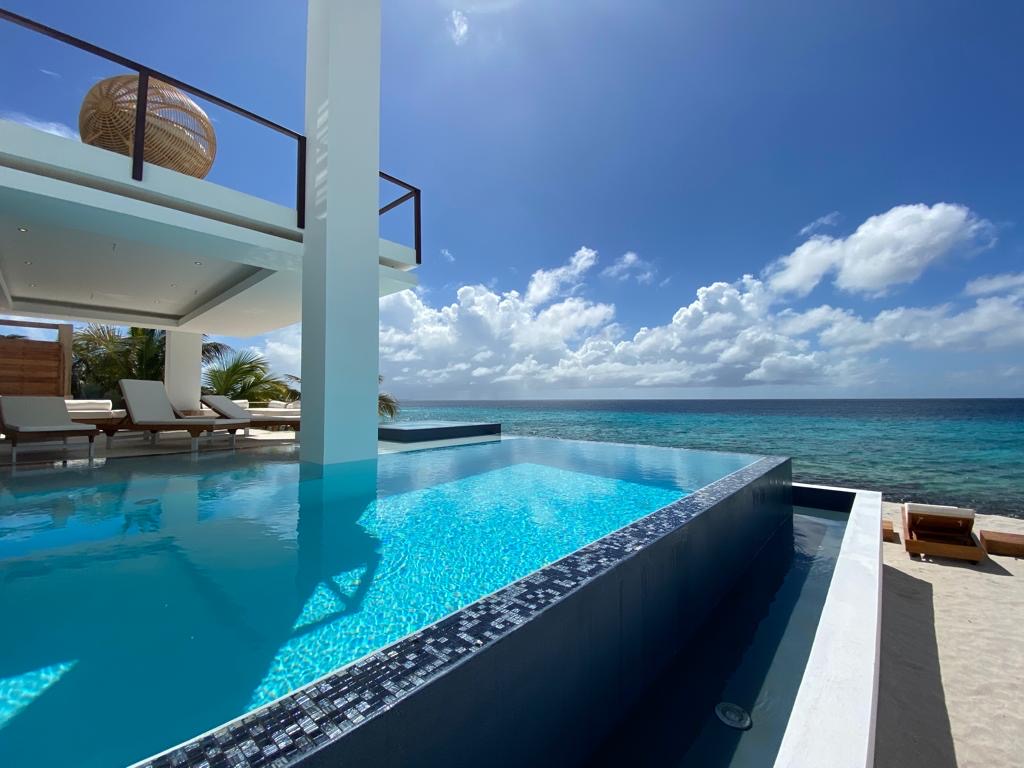 Beach Villa 2’s private pool looking out over the Caribbean